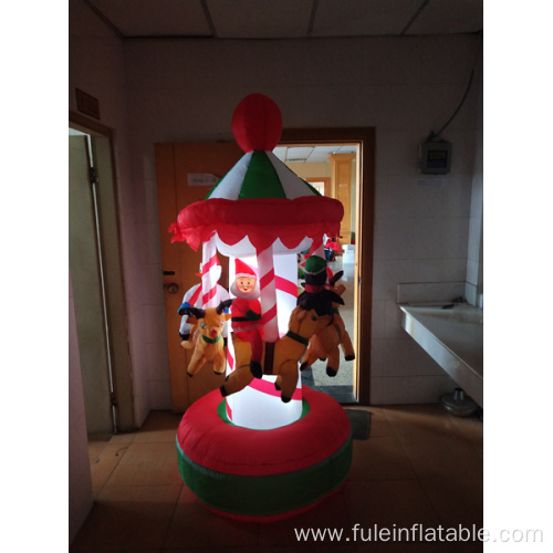 Happy holiday inflatable spinning carrousel for Christmas